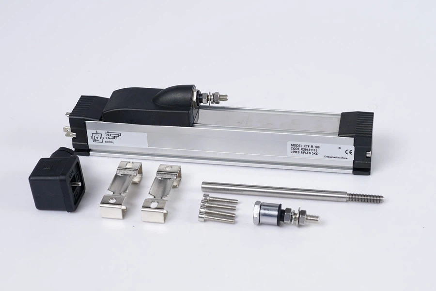 Linear displacement sensor for injection molding machine