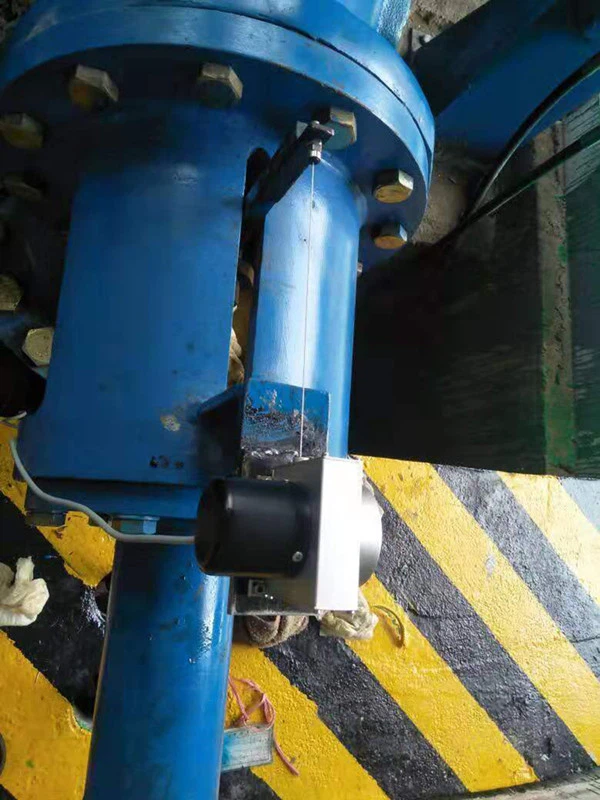 MPS rope displacement sensor for gate opening control